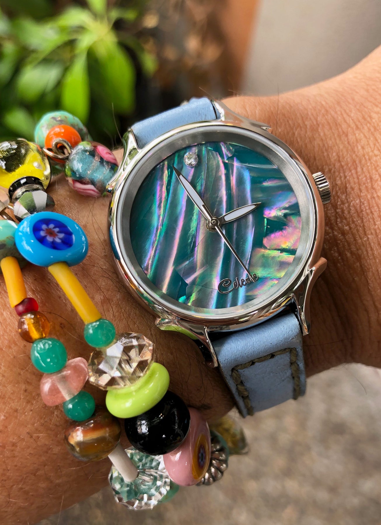 30mm Awabi abalone women's watch dial with a baby blue vegetable tanned leather band.