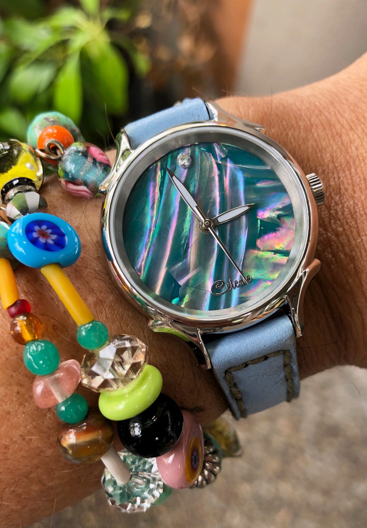 30mm Awabi abalone women's watch dial with a baby blue vegetable tanned leather band.