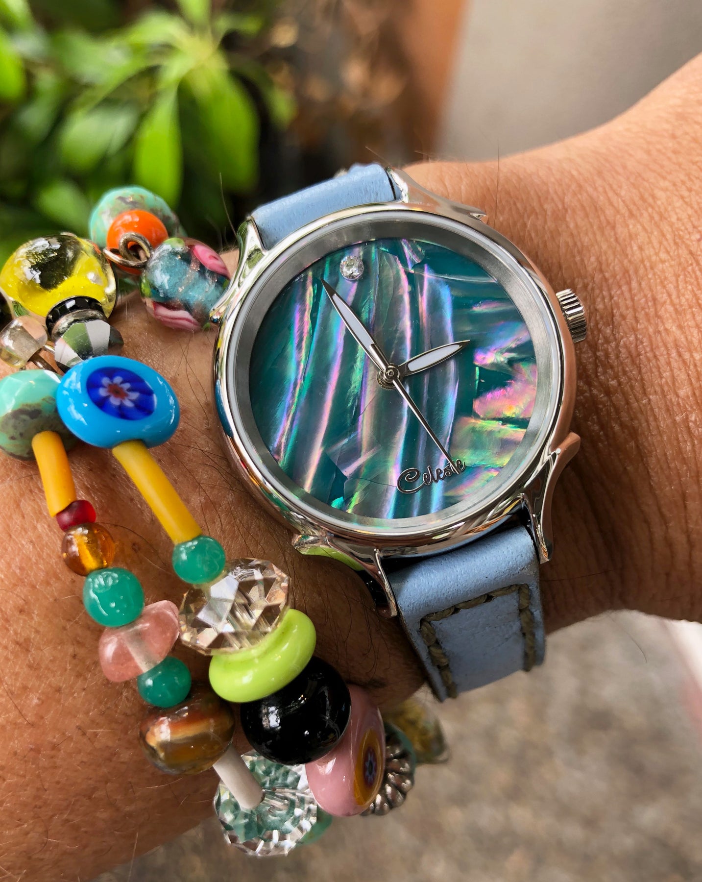 30mm Awabi abalone women's watch dial with a baby blue vegetable tanned leather band.