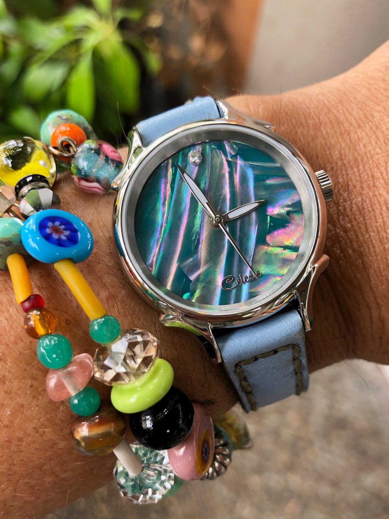 30mm Awabi abalone women's watch dial with a baby blue vegetable tanned leather band.