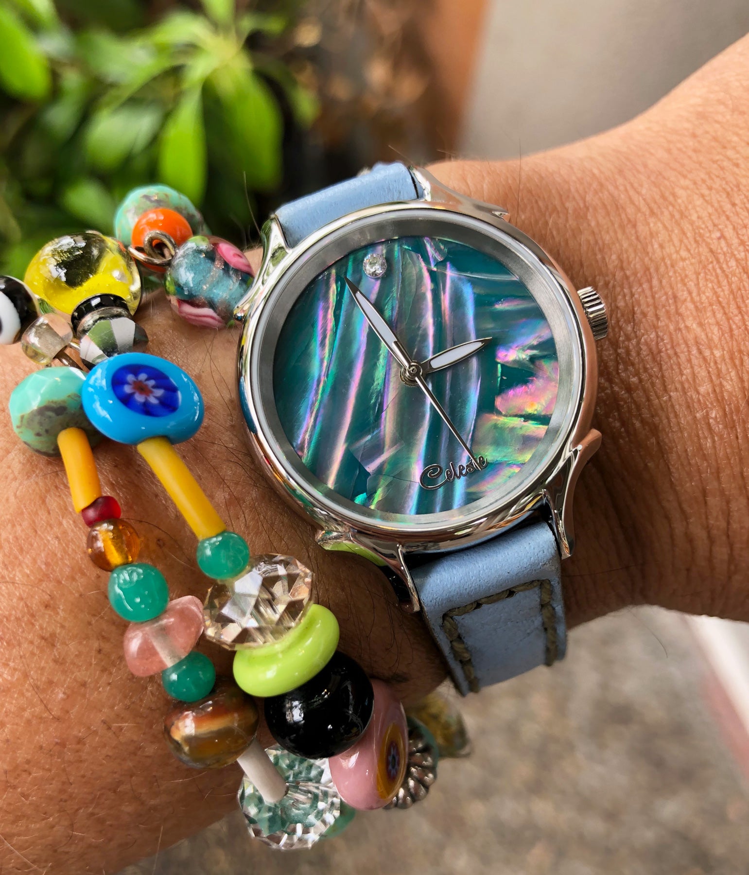 30mm Awabi abalone women's watch dial with a baby blue vegetable tanned leather band.