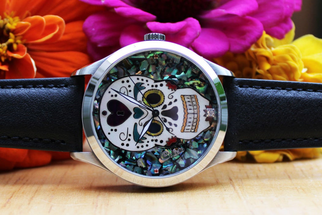 Handcrafted Sugar Skull watch made with abalone shell and mother of pearl.
